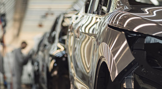 Pollice dell'industria automobilistica